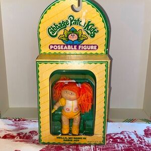 Vintage cabbage, patch kids poseable figure her name is Gabby Joy with orange